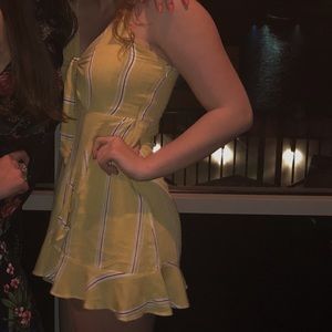 Yellow, red, and white striped dress with cutout tie in the front!